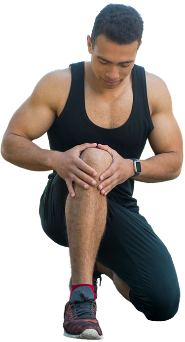 Athletic man holding his knee in discomfort